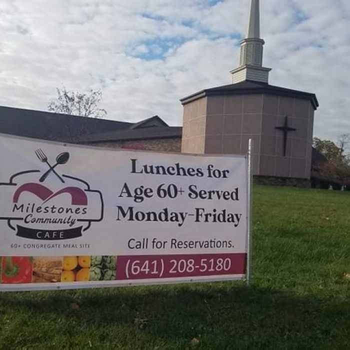 Milestones sign in front of church